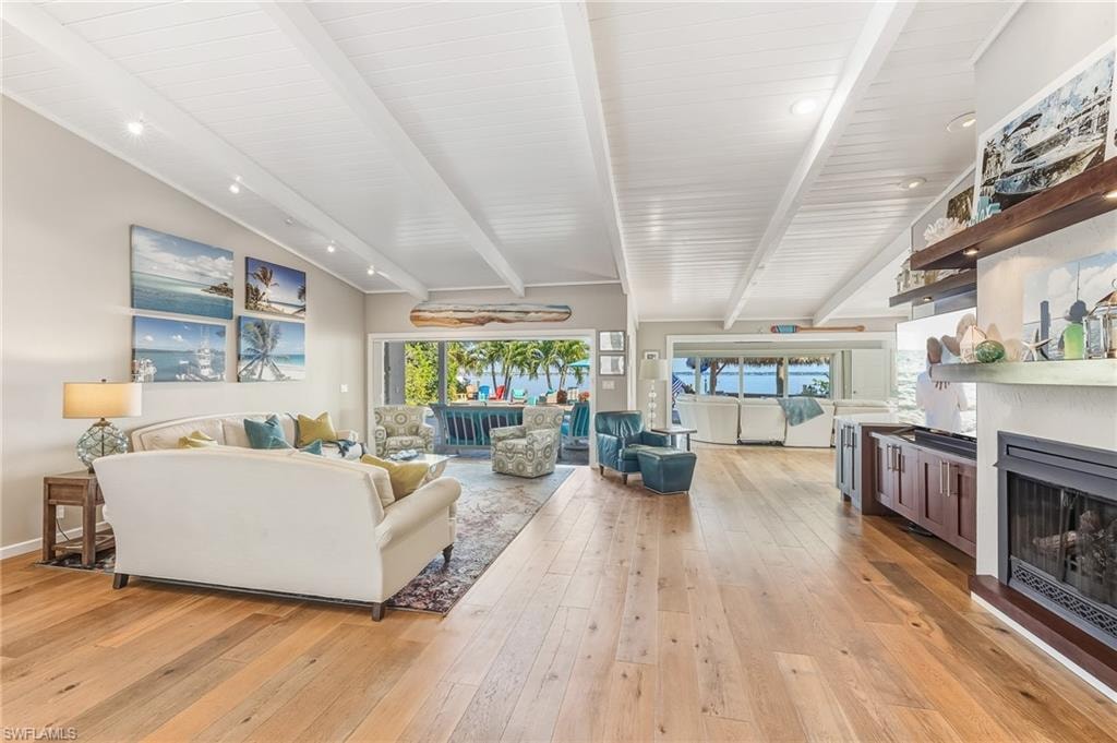 Living area featuring a fireplace and light wood-type flooring