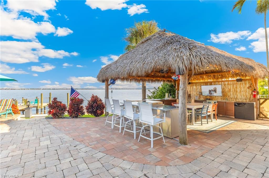 View of patio / terrace with a water view