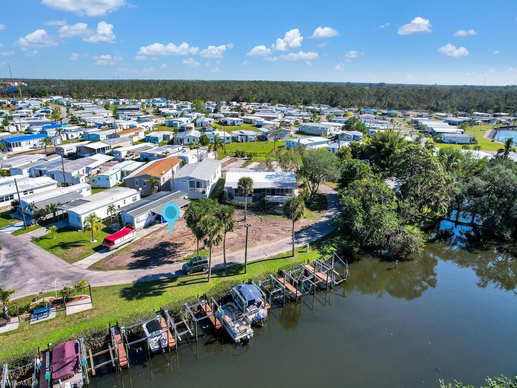 Aerial view of residential area with a nearby body of water