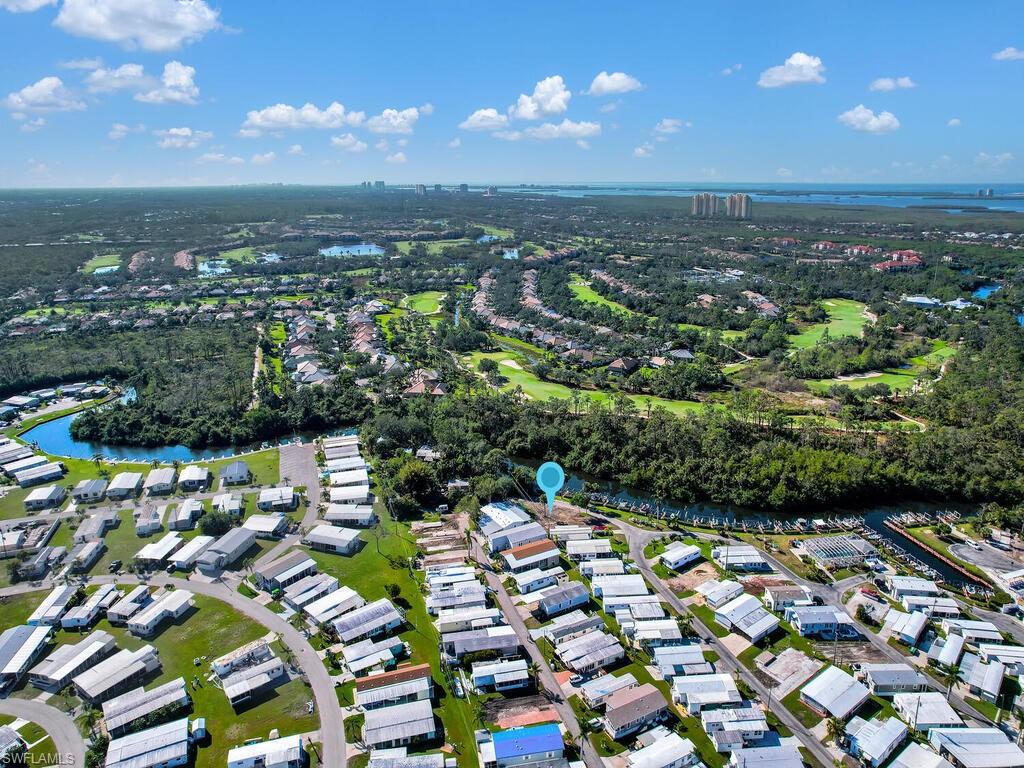 View of property location with nearby suburban area