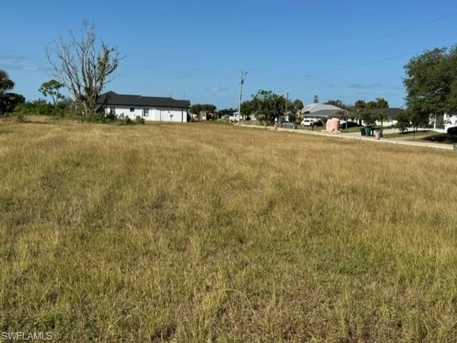 View of three lots looking west