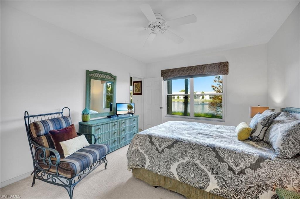 Bedroom featuring carpet flooring and a ceiling fan