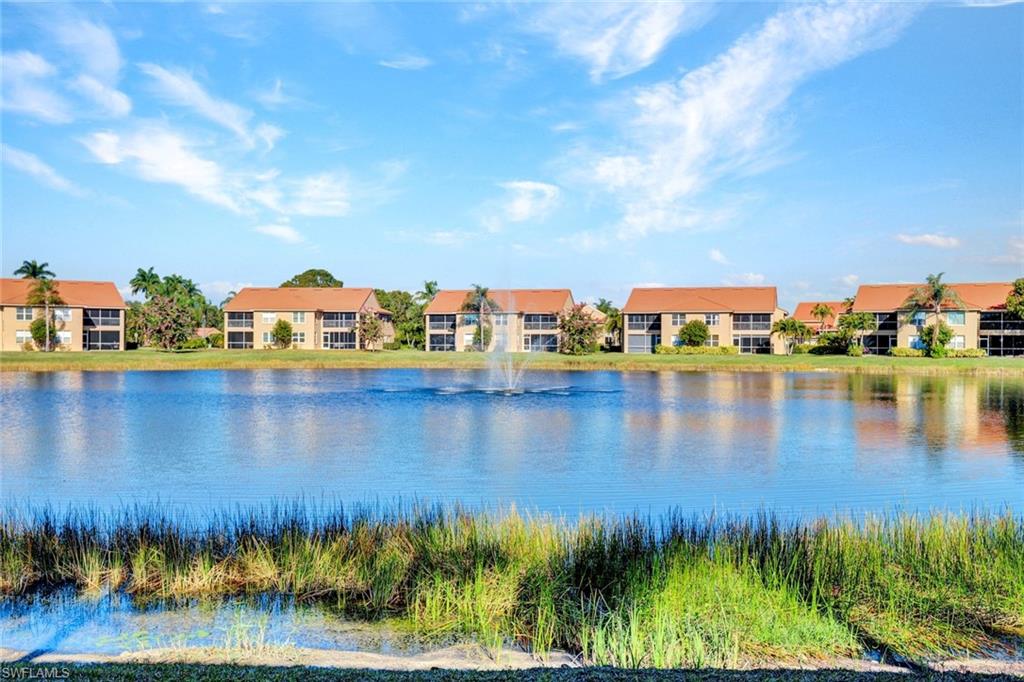 Water view featuring nearby suburban area