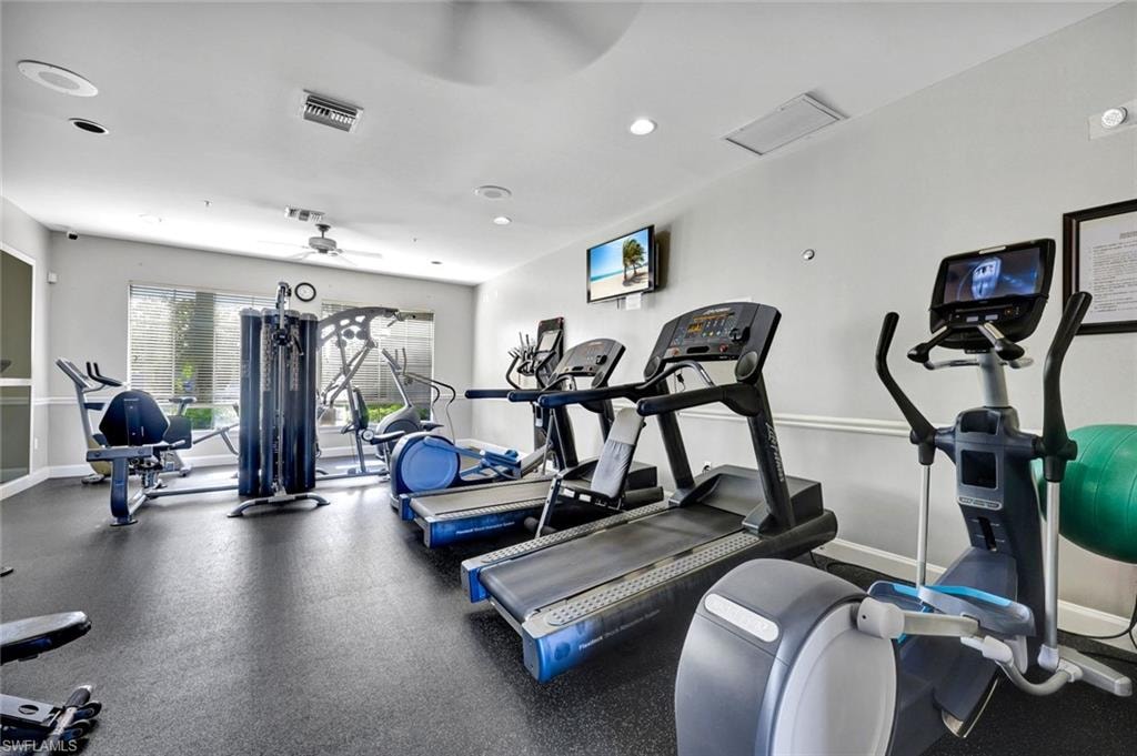 Workout area with recessed lighting and ceiling fan