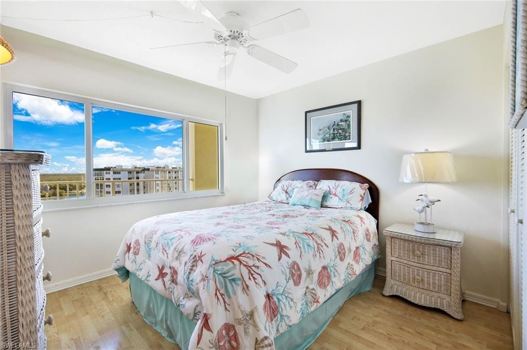 Bedroom with light wood-style flooring and ceiling fan