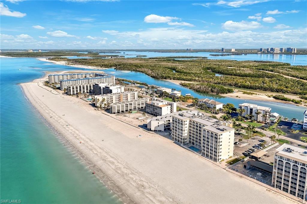 View of urban area with expansive beach