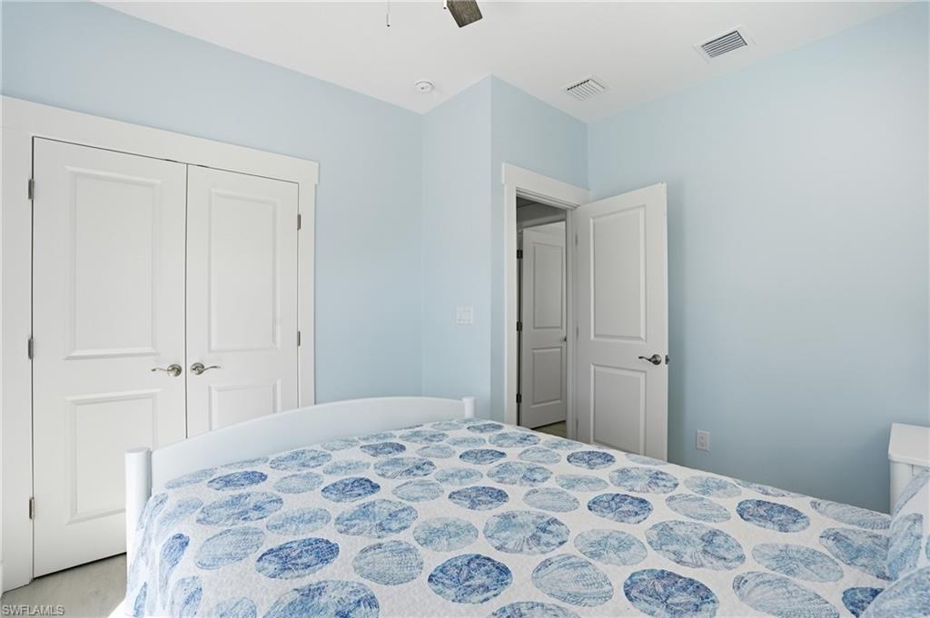 Interior room with light blue walls and white trim - Virtually Edited Image