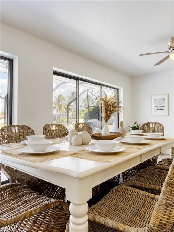 Dining area with a ceiling fan