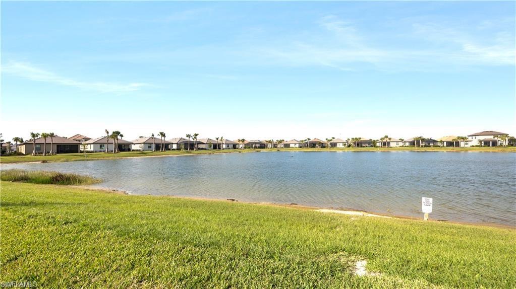 Water view with nearby suburban area