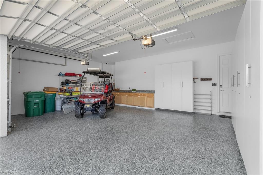 3 Car Garage with storage and work bench