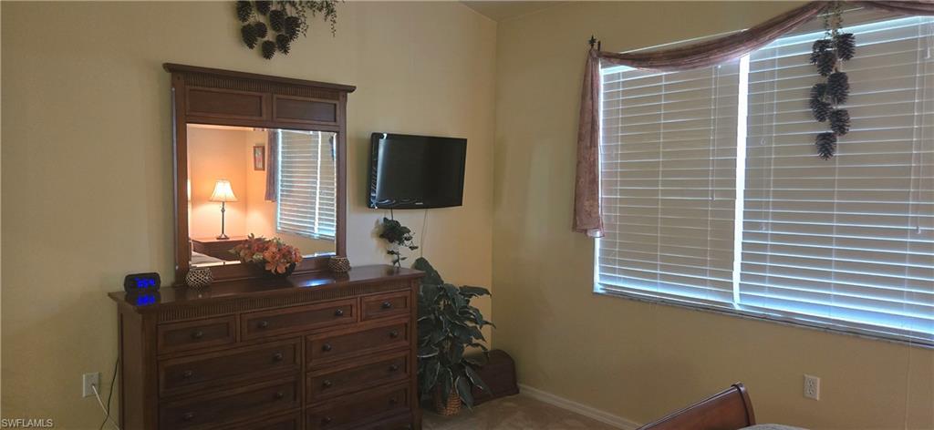 View of carpeted master bedroom
