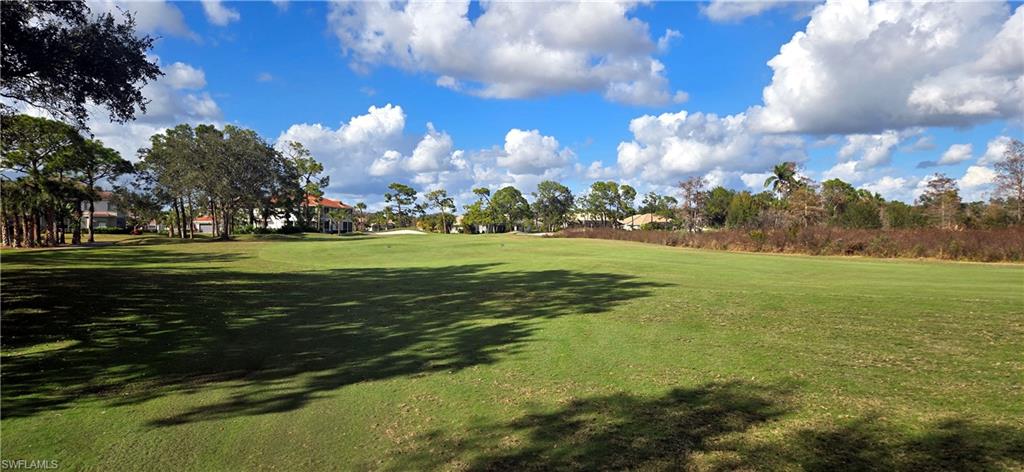 View of property's community featuring view of golf course.