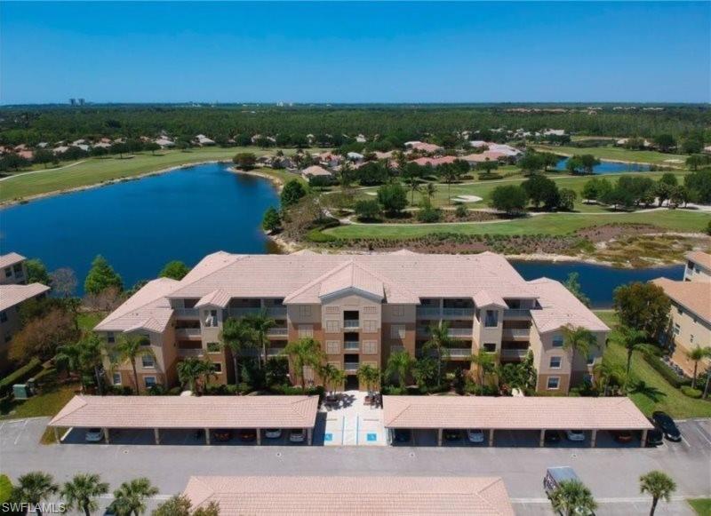 Aerial view of a golf club and a nearby body of water