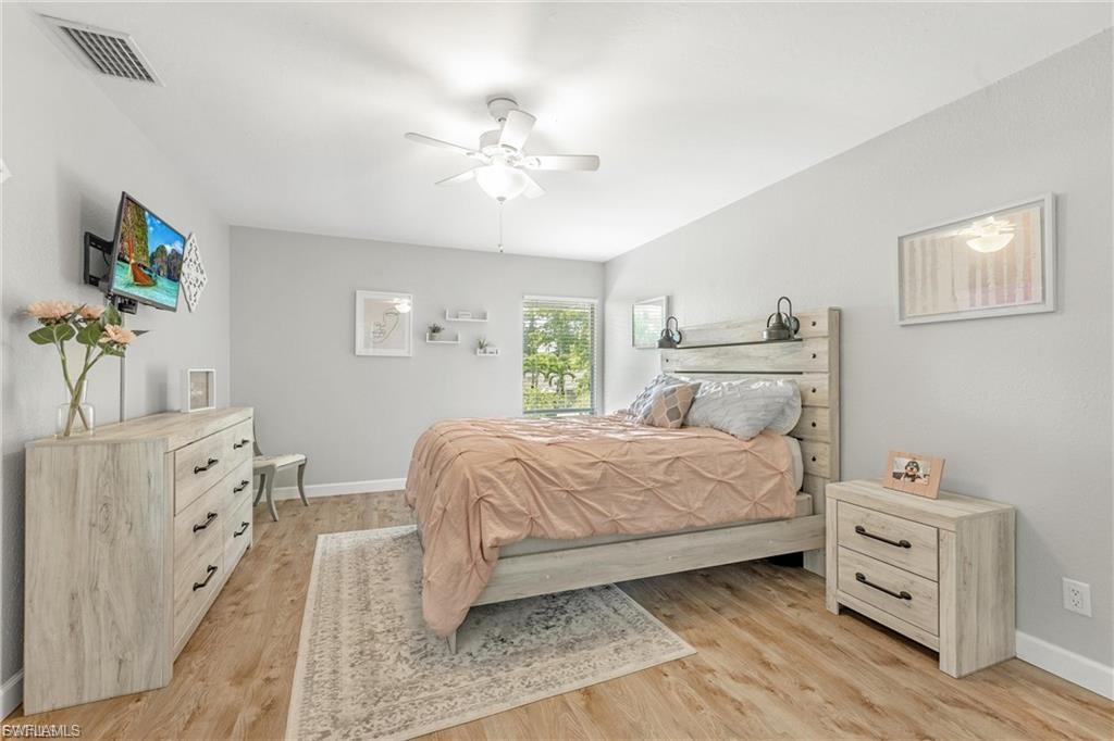 Bedroom featuring ceiling fan and light wood-style floors