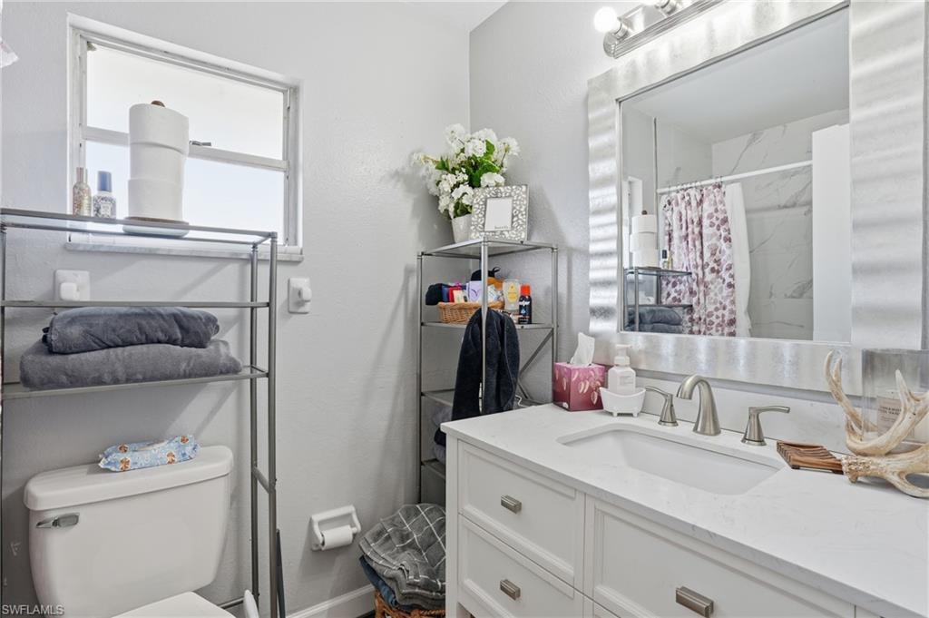 Bathroom featuring a shower with tub