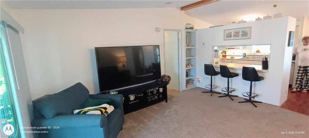 View of carpeted living area