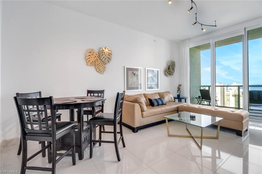 Living room with light tile patterned floors