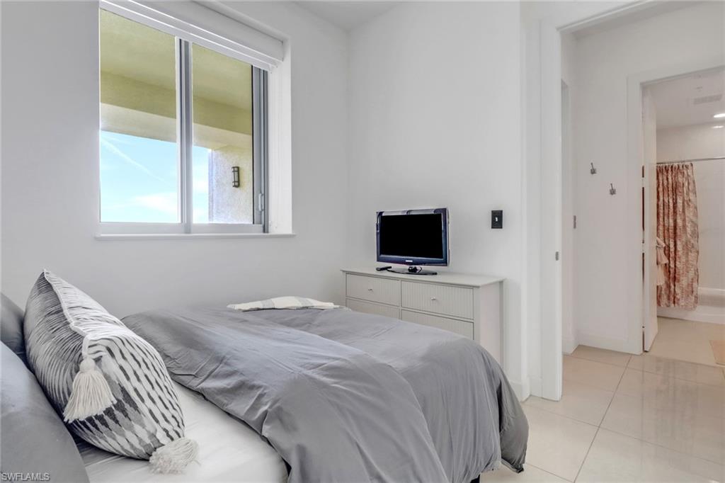 Bedroom featuring light tile patterned floors