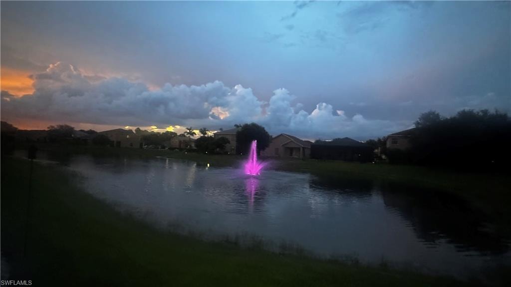 Water view featuring nearby suburban area