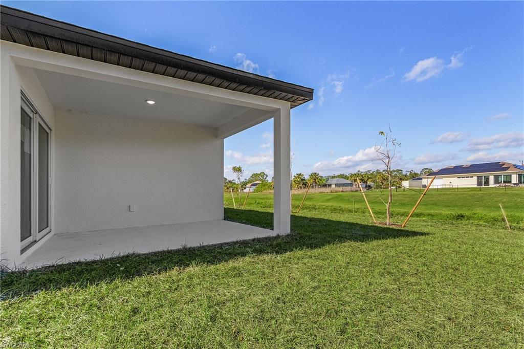 View of yard with a patio area