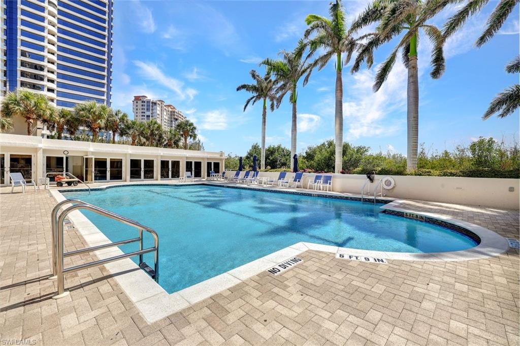 Community pool featuring a patio area