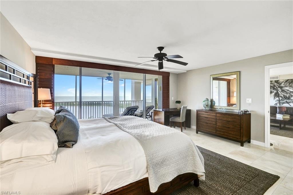 Bedroom with baseboards, a water view, a ceiling fan, access to exterior, and light tile patterned flooring