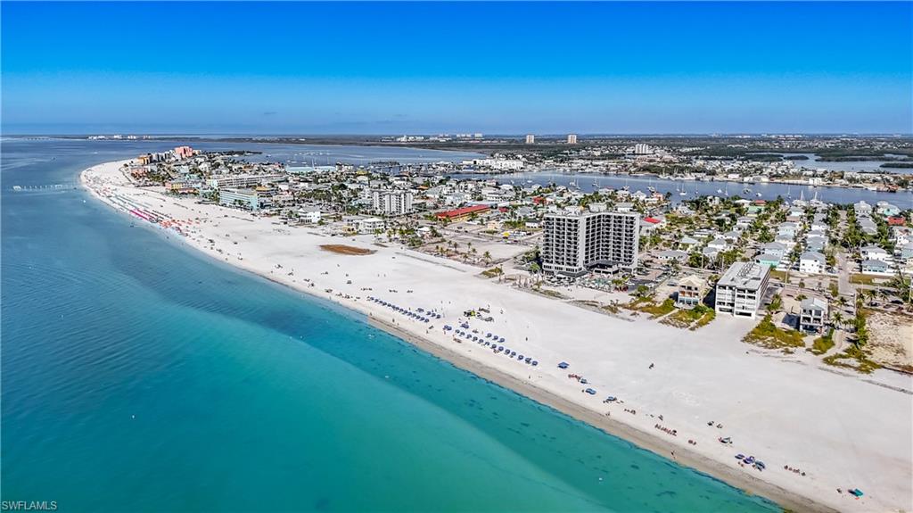 View of urban area with expansive beach