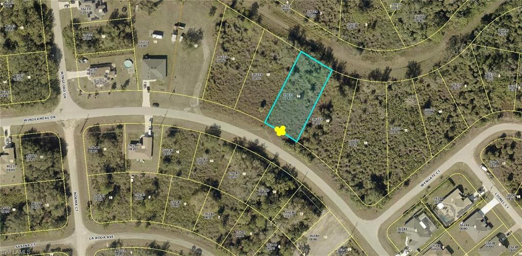 Aerial map of property and surrounding area featuring property parcel outlined