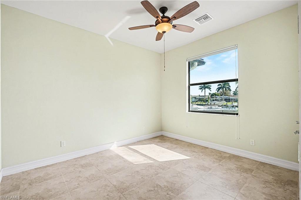 Guest bedroom with a view of the canal