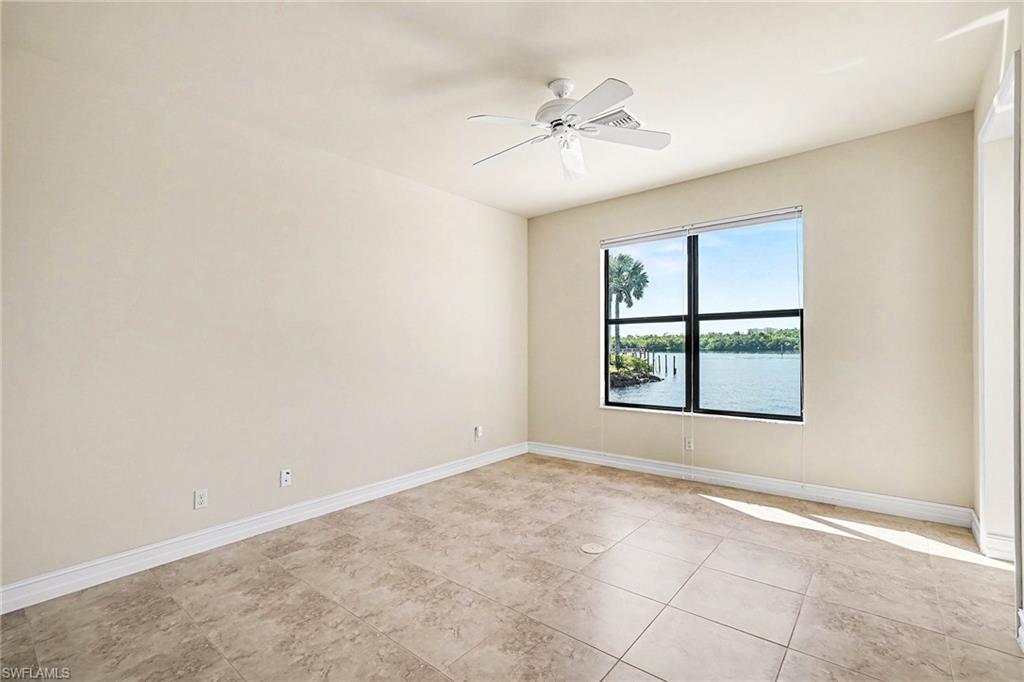 Guest bedroom with view of the lagoon and preserve