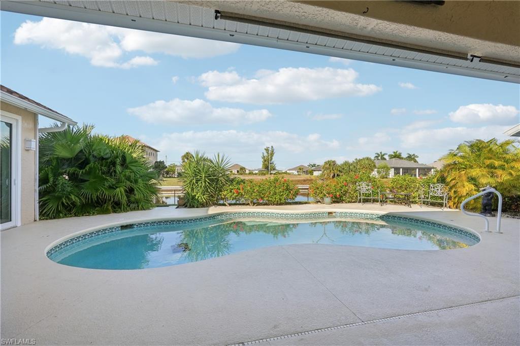 Swimming pool with a patio