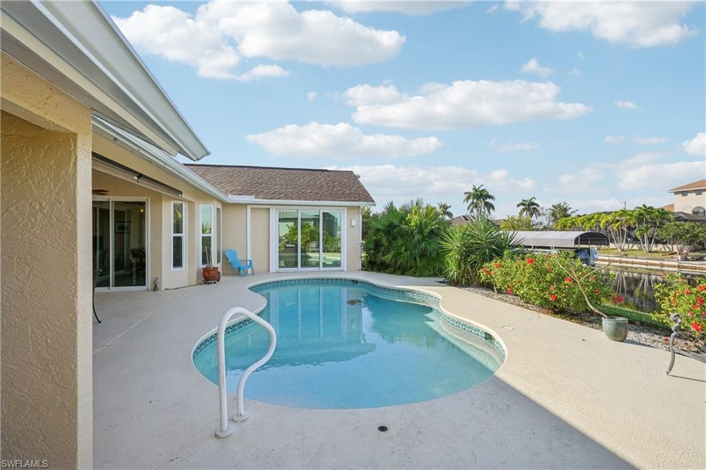 Outdoor pool with a patio
