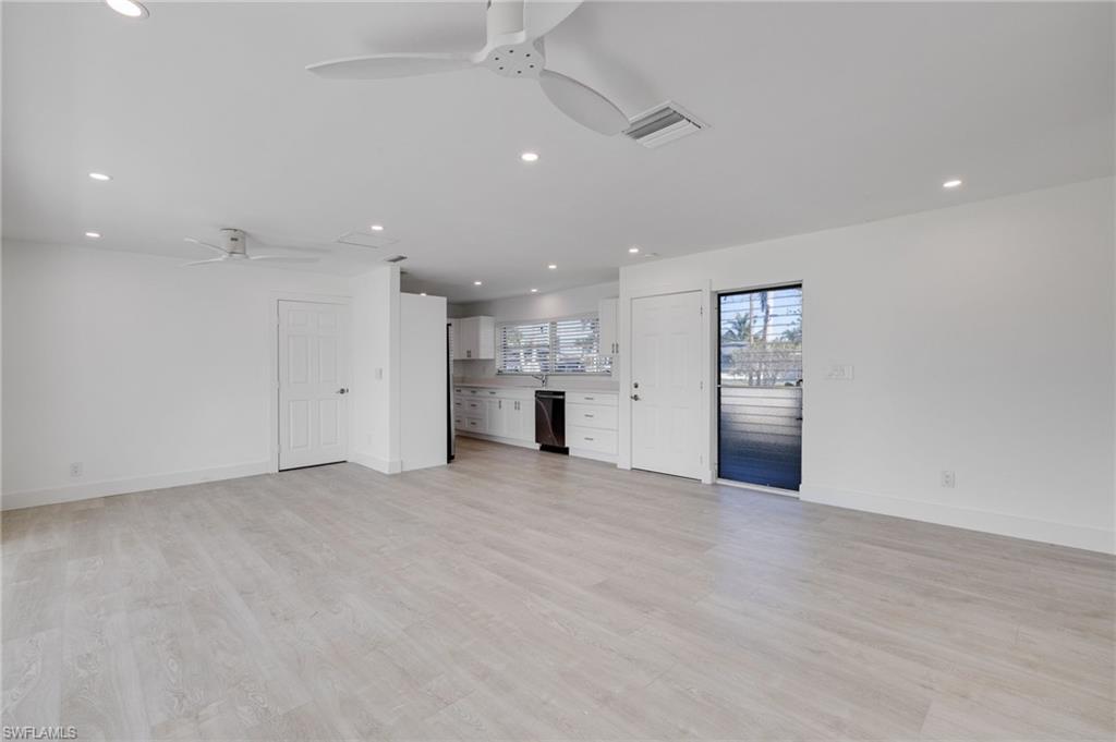 Unfurnished living room featuring recessed lighting, light wood-style floors, and ceiling fan