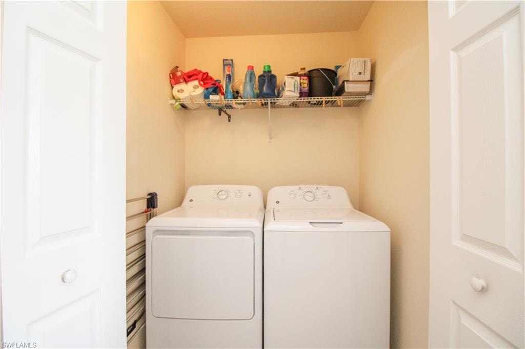 Clothes washing area with washing machine and clothes dryer
