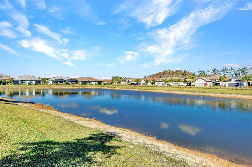 Water view with nearby suburban area