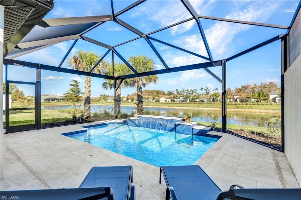 Swimming pool featuring a lanai, a sunroom, a water view, a patio, and a residential view
