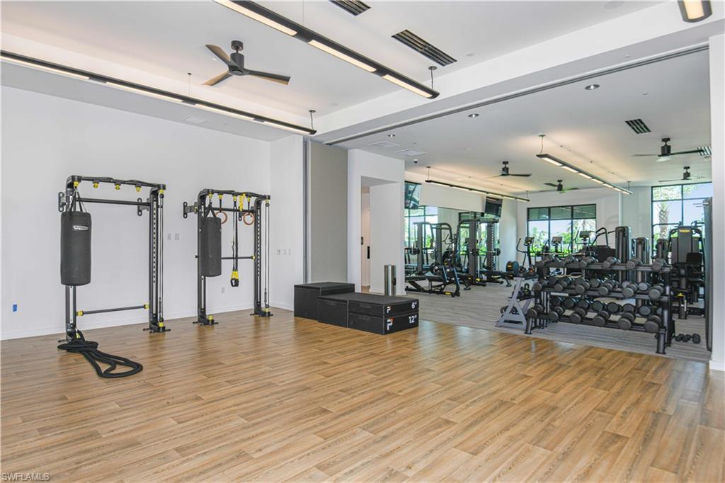 Gym featuring a ceiling fan