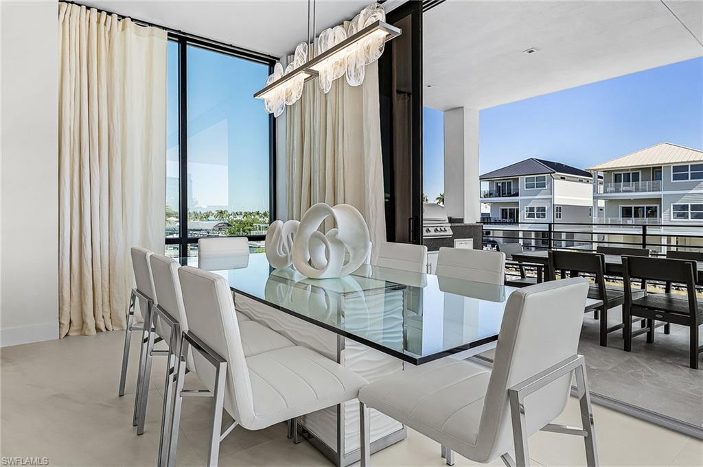 Dining area with expansive windows - Virtually Edited Image
