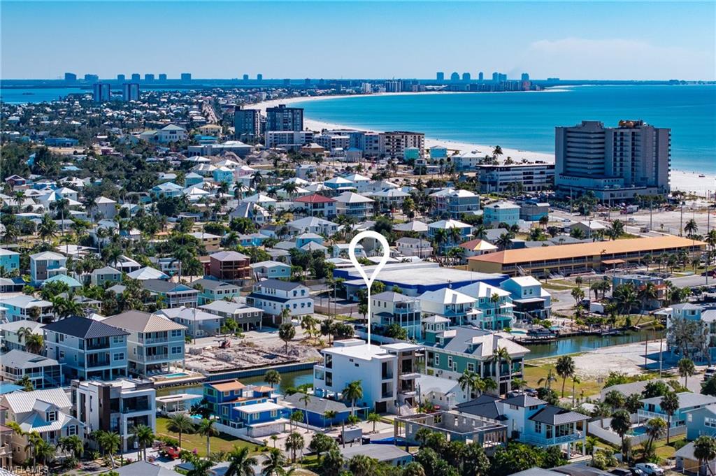 Drone / aerial view of city skyline and a large body of water - Virtually Edited Image