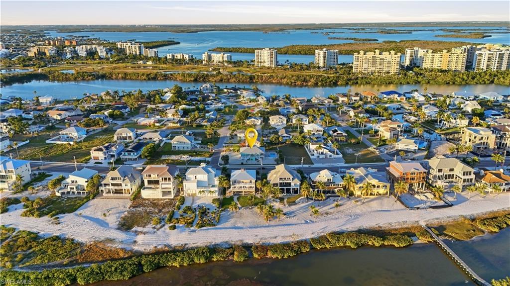 View of urban area featuring nearby suburban area and a nearby body of water - Virtually Edited Image