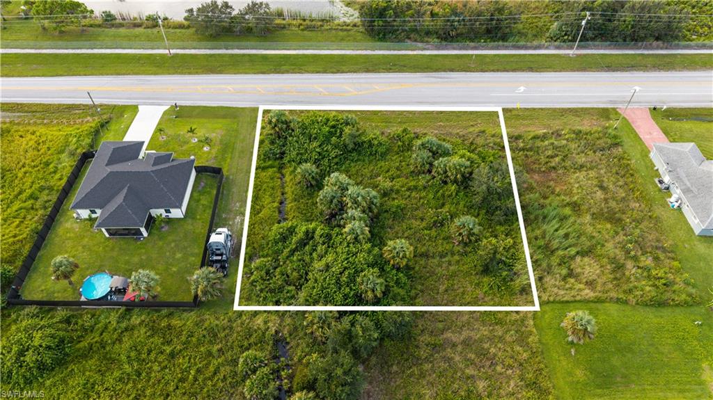 Aerial view of property's location featuring property parcel outlined
