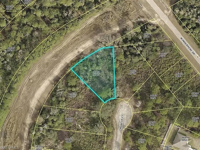 Aerial view of property's location featuring property parcel outlined