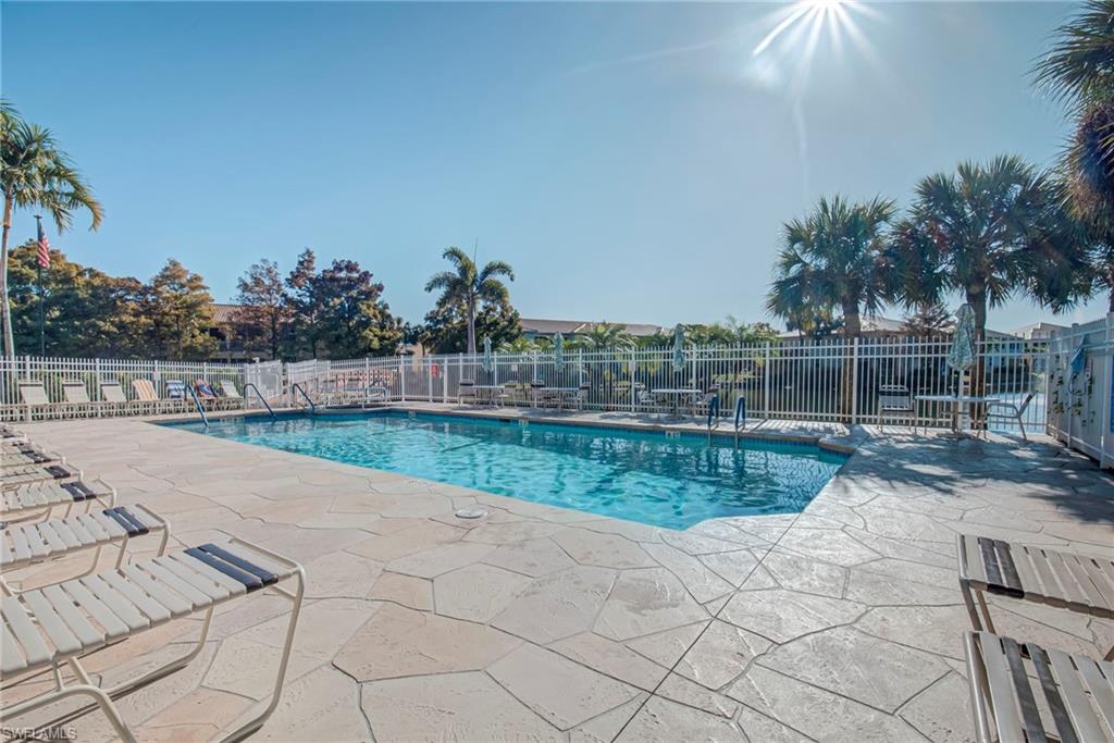 Community pool featuring a patio area