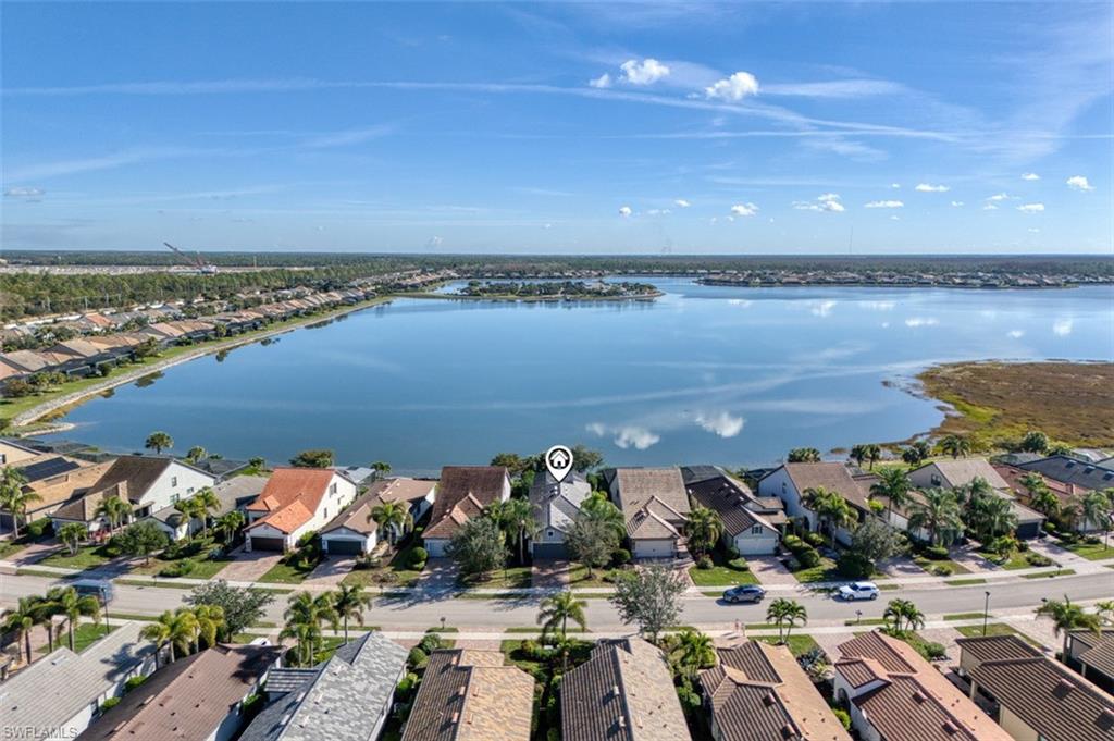 Aerial of Front of Pool Home on Large Lake