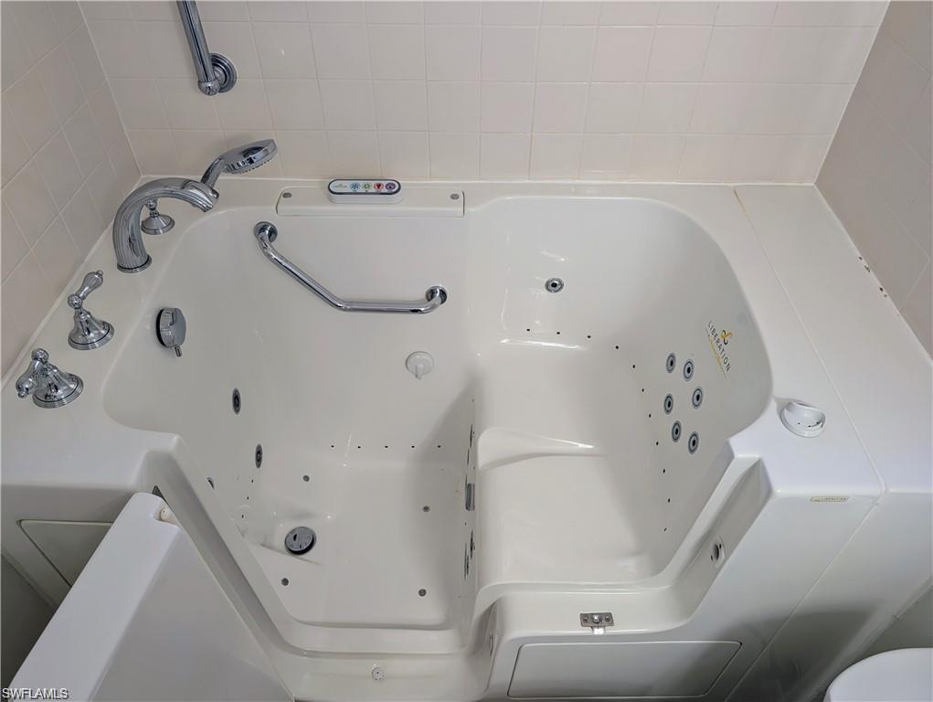Bathroom view of a jetted tub