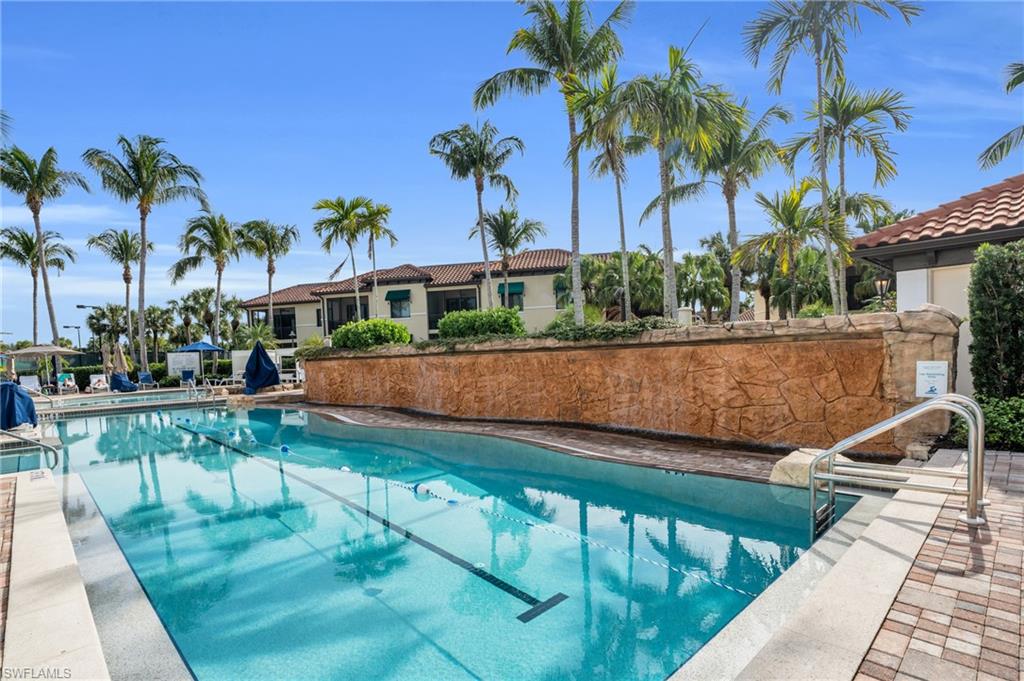 Community pool featuring a patio area