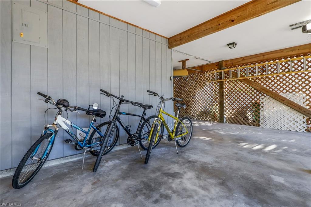 Garage featuring wooden walls