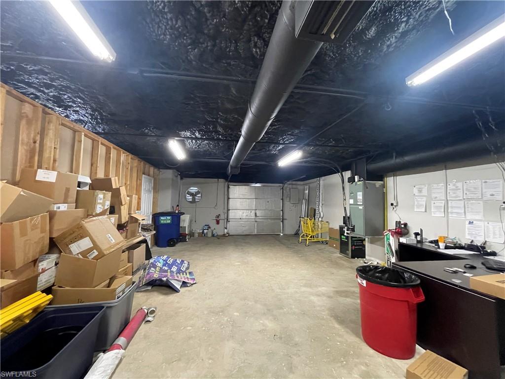 Garage featuring heating unit