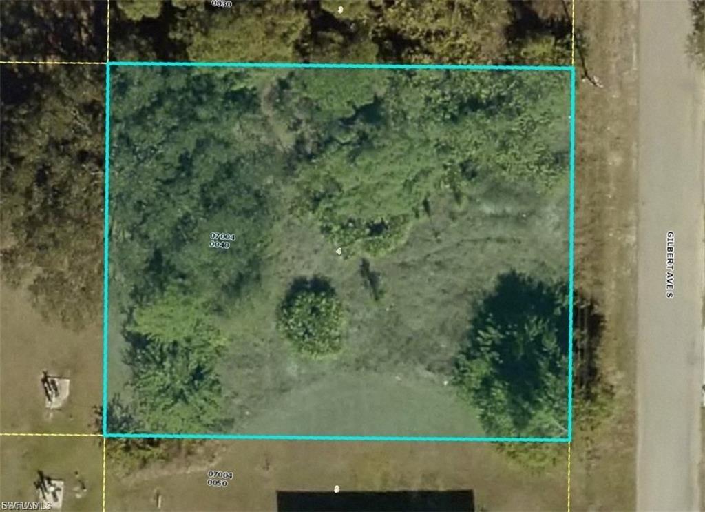 Aerial overview of property's location featuring property parcel outlined