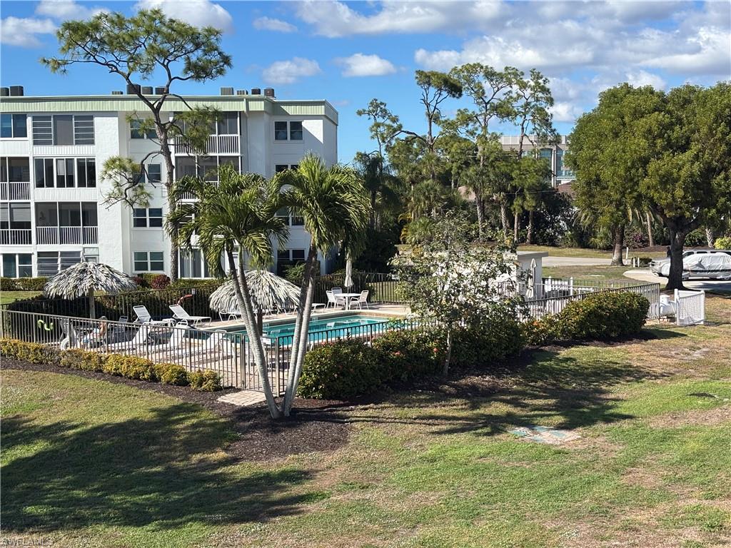 Heated Pool right outside unit front door.